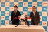 日本郵便、ACSLと業務提携、有人地帯でのドローン飛行に向け
